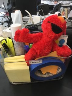 Elmo acronym, the cute red monster from Sesame Street, in our supply caddy