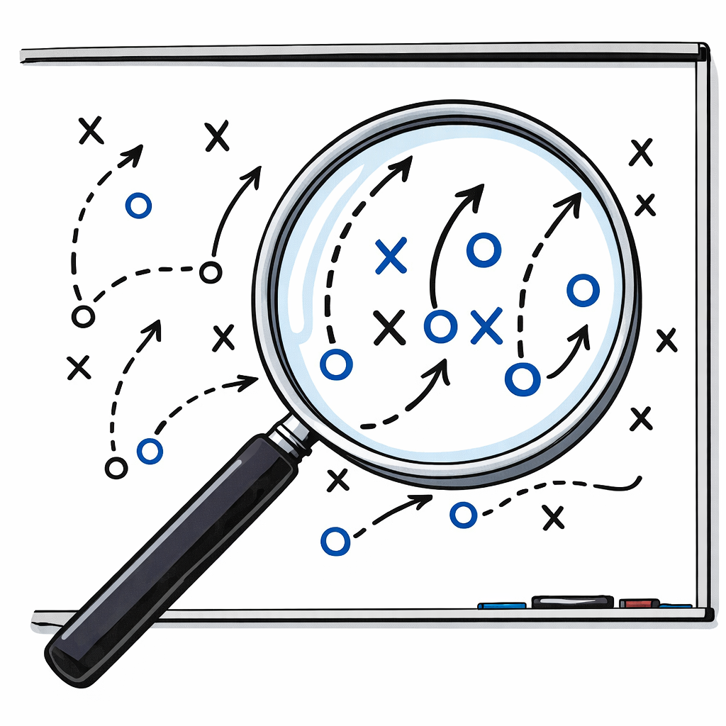 A magnifying glass held over a whiteboard football playbook of Xs, Os, and arrows — sharper through the lens